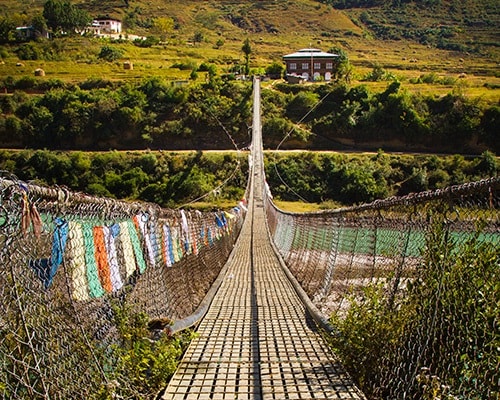 Journeying into Remote Villages of Bhutan Suspension Bridge